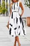 Floral Print Pocket Sleeveless Smocked Split Dress